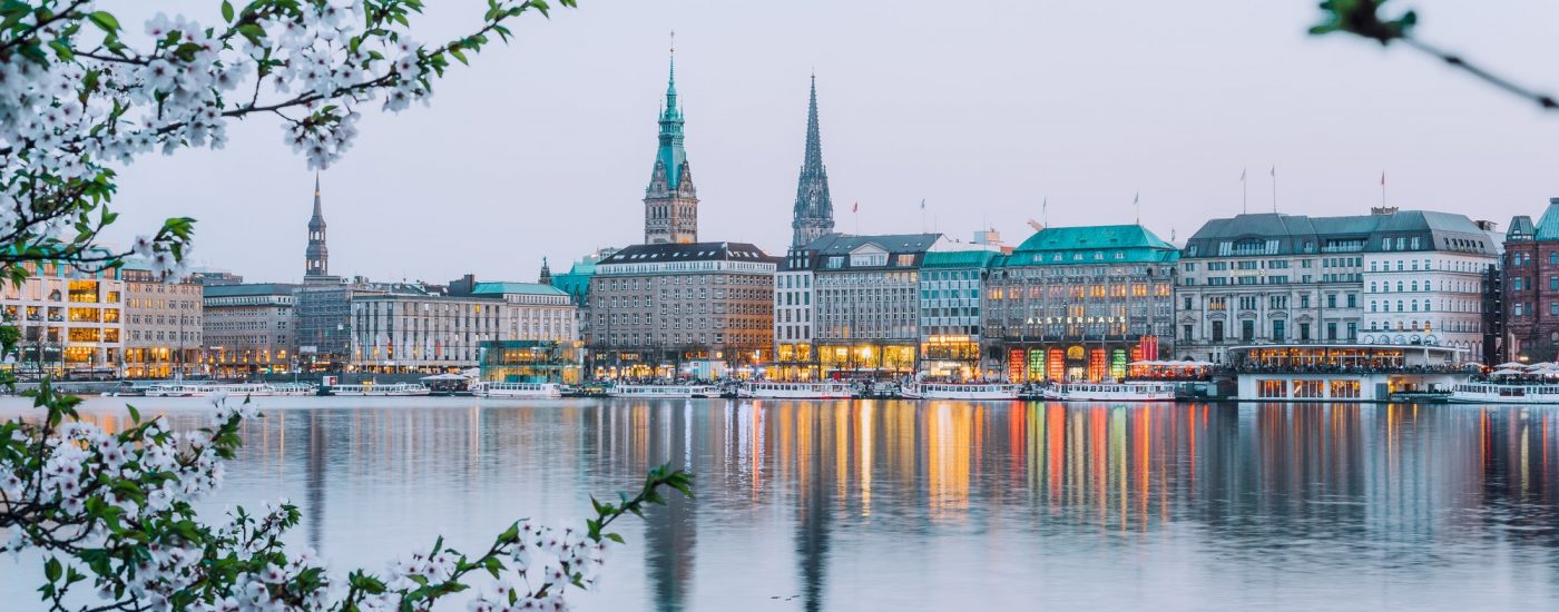 Beautiful view of Hamburg town hall - Rathaus and Alster river at spring earning evening